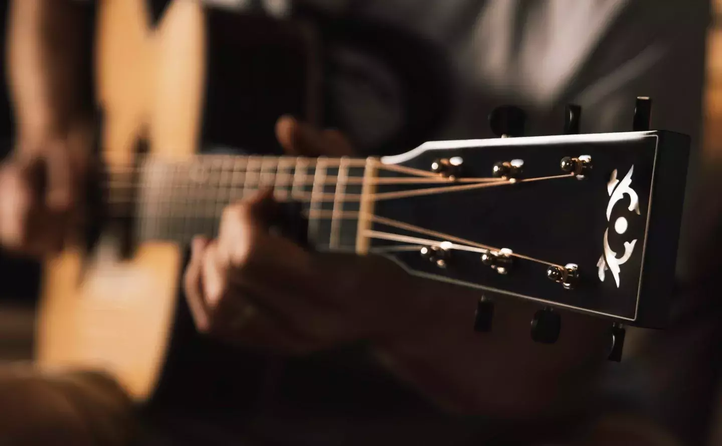 playing acoustic guitar